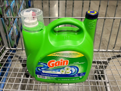 Laundry Detergent Product on a shopping cart with the name Gain Blissful Breeze Laundry Liquid 5.91L written at the front, this is a product for Costco online shopping in NZ.